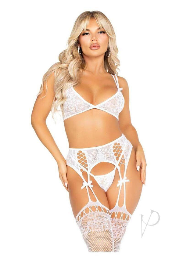 Model wearing Leg Avenue white lace bra top and G-string panty with dual strap detail and lace stockings.