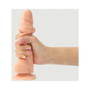 Strap-On-Me Sliding Skin Realistic Dildo Vanilla Small held in hand, showcasing its lifelike design and sliding skin feature.