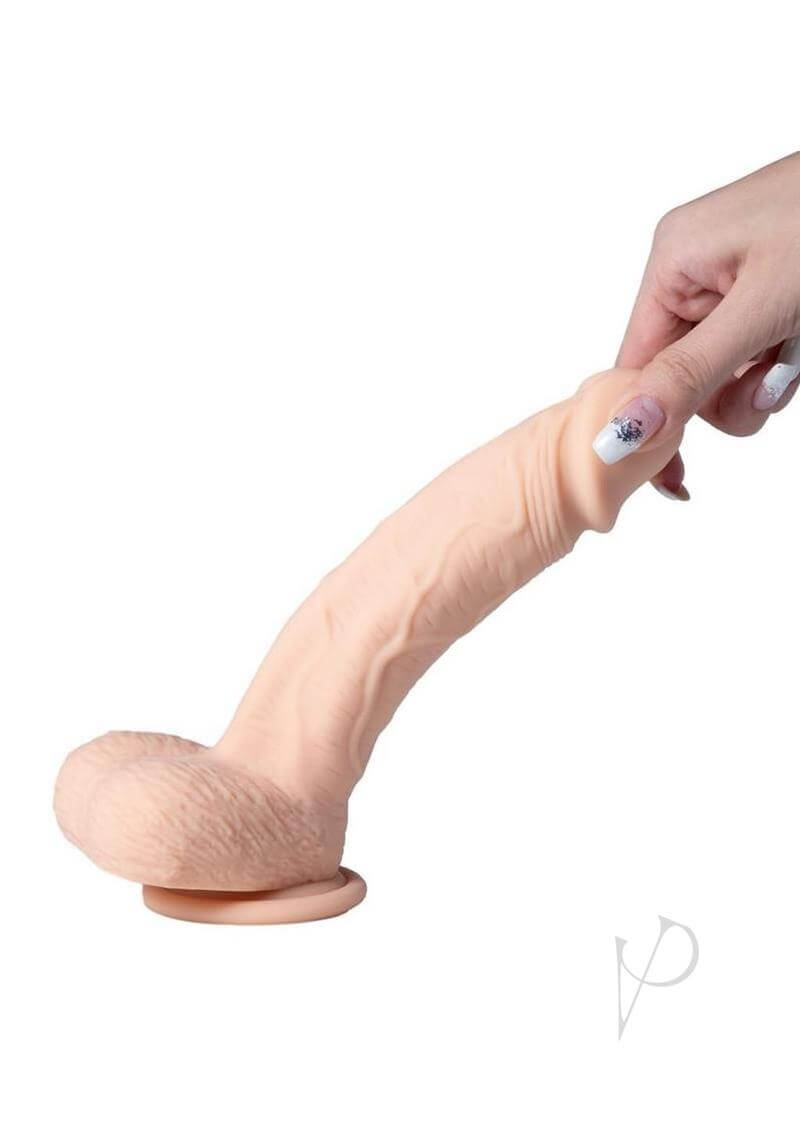 Paxton 8.5 inches App Controlled Vibrating Dildo Tan with lifelike shaft and suction base for versatile pleasure.