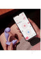 Trill Wearable Dual Vibrator Lavender by Honey Play Box next to a smartphone displaying its app controls.