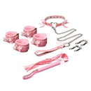 Master Series Kawaii Bondage Set Pink featuring wrist cuffs, collar, leash, and whip in soft pink with decorative bows.