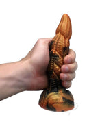 Kiotos Monstar Cox Ravex Silicone Cock with Suction Cup held in hand, highlighting its unique design and textured surface.