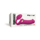 Strap-On-Me Multi Orgasm Strapless Strap-On Fuchsia XL packaging with remote control and toy design.