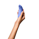 Dame Aer Suction Toy Periwinkle held in hand, showcasing its innovative design for enhanced pleasure.