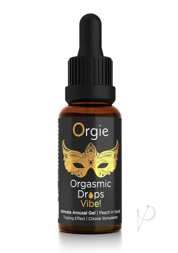 Orgie Orgasmic Drops Vibe 0.5 Oz Tingling Clitoral Arousal Serum bottle with a black label and golden mask design.