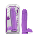 Blush Neo 11 Inch Dual Density Dildo With Balls Neon Purple in package, featuring a lifelike design and suction base.