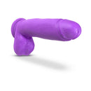 Blush Neo 11 Inch Dual Density Dildo With Balls Neon Purple on a white background, showcasing its lifelike design and color.