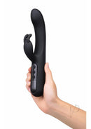Bodywand Digi Rabbit Silicone Rabbit Vibrator Black held in hand, sleek design with LED display for easy use.