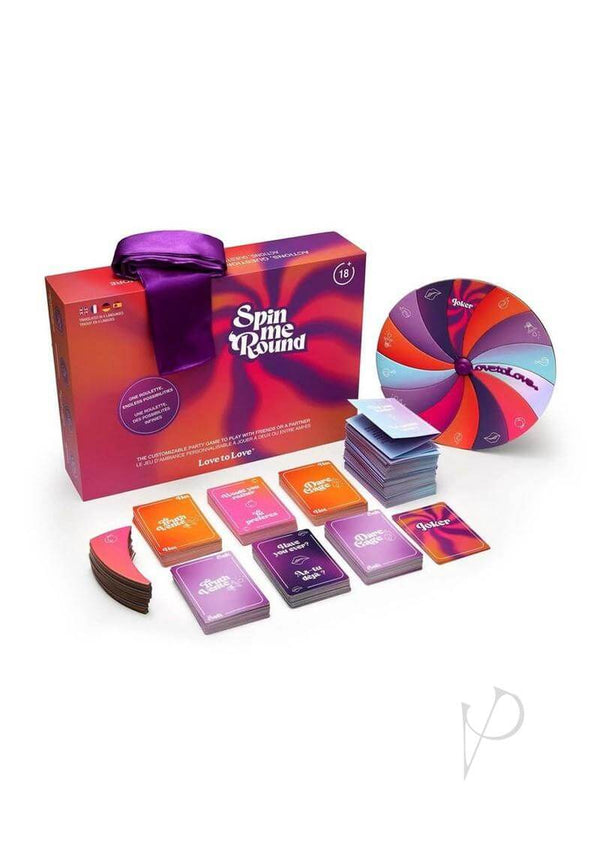 Love To Love Spin Me Around Game box and components with a colorful spinner and challenge cards.