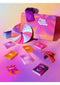 Love To Love Spin Me Around Game with colorful cards and roulette wheel for fun and intimacy.