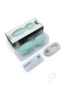 Pixey 2GO Rechargeable Silicone Mini Wand Ocean Green in packaging with user manual and charging cable.