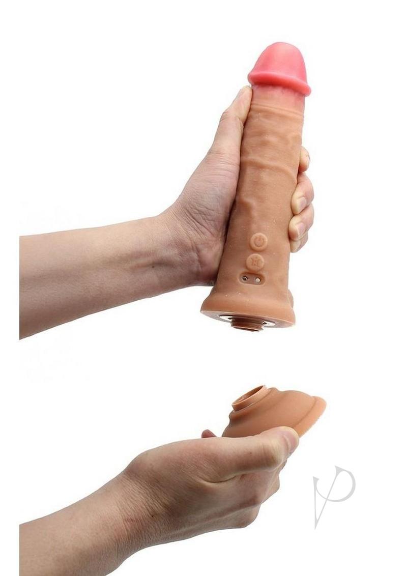 Kiotos Cox Power Squirt Vibrating Dildo with Remote Control held in hand, showcasing its realistic design and features.