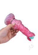 Hand holding the Monstar Cox Alienspawn Cock Silicone Dildo with Eggs Pink showcasing its textured design and vibrant color.