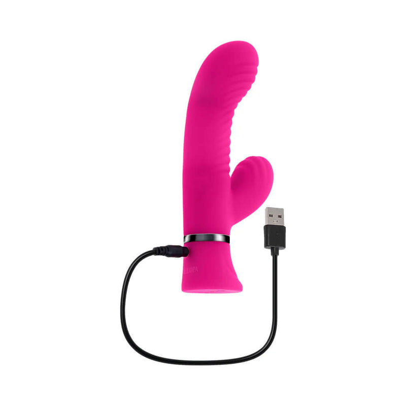 Pink Next Wave Dual Vibrator with curved, wavy grooves and USB charger, offering 10 vibrating speeds for custom pleasure.