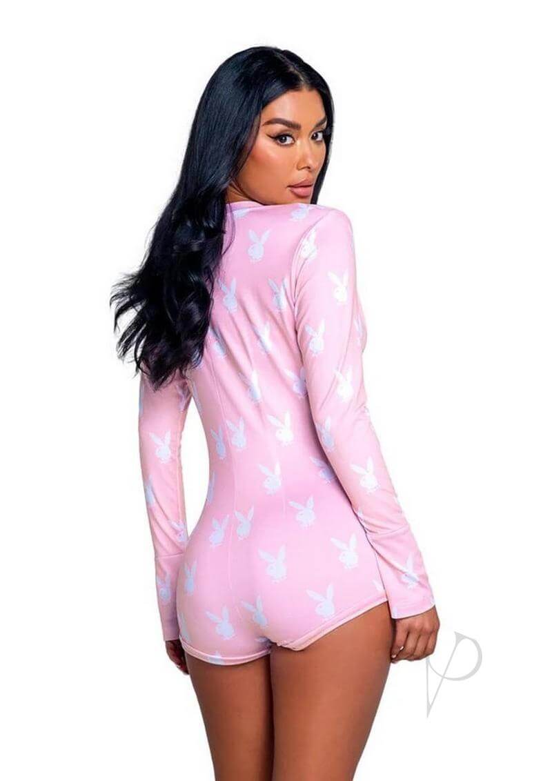 Woman modeling Playboy Slumber Bunny Romper Small Medium Pink with bunny pattern, showing playful charm and cozy comfort.