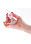 Cosmic Glams Silicone Anal Plug Small Pink held in hand, showcasing its smooth design and sparkling internal marble.