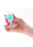Cosmic Glams Silicone Anal Plug Medium Blue held in hand showcasing its sparkling blue glass marble.