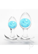 Cosmic Glams Silicone Anal Plug 2 Piece Kit Blue featuring two clear plugs with blue glass marbles for anal play.