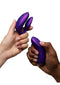 We Vibe Chorus Pro Couples Vibrator with Remote Control Purple held by two hands.