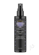 Sex Magnet Pheromone Body Oil Spray 4 Oz Blue Lotus bottle with floral design and pheromone-infused oil.