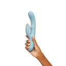 FemmeFunn Balai Swaying Motion Dual Stimulation Vibrator Blue held in hand, showcasing its elegant design and soft silicone.