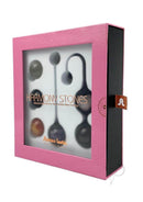 Adrien Lastic Harmony Stones Kegel Exerciser Balls in a pink box showcasing six natural stones for pelvic floor wellness.