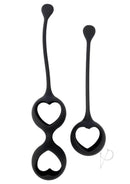 Adrien Lastic Harmony Stones Kegel Exerciser Balls in sleek black design with heart-shaped details.