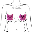 Pastease Hot Pink Glitter Bow Nipple Pasties on a model showcasing a playful and flirty design.