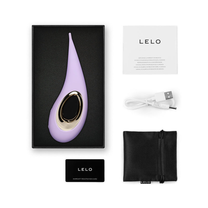 LELO DOT Elliptical Clitoral Stimulator Lilac inside packaging with accessories and user guide.