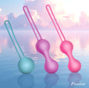 Passion Silicone Weighted Kegel Ball Set in blue, purple, and pink against a serene water background.