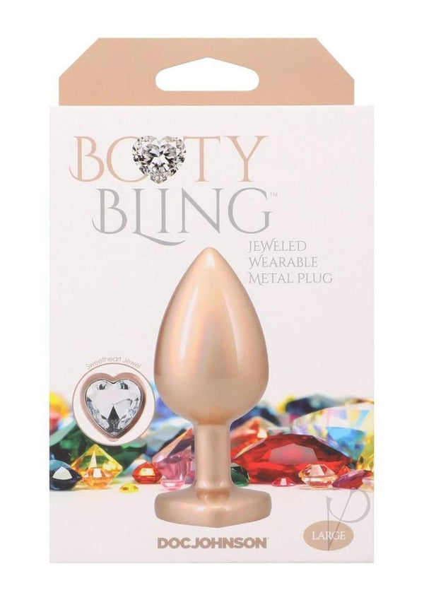 Booty Bling Heart Diamond Jeweled Wearable Metal Plug Large packaging with colorful jewel background.