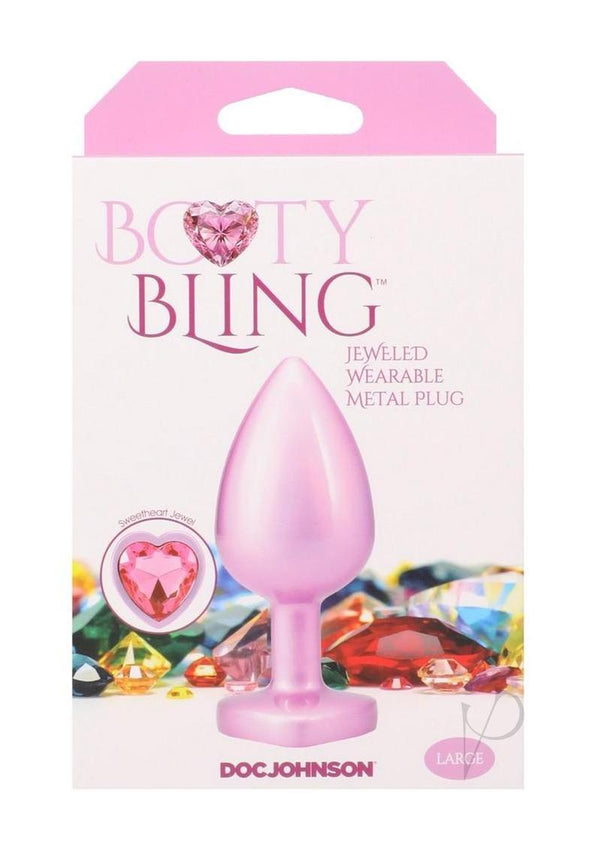 Booty Bling Heart Diamond Jeweled Wearable Metal Plug Large Pink packaging with gem details and branding.