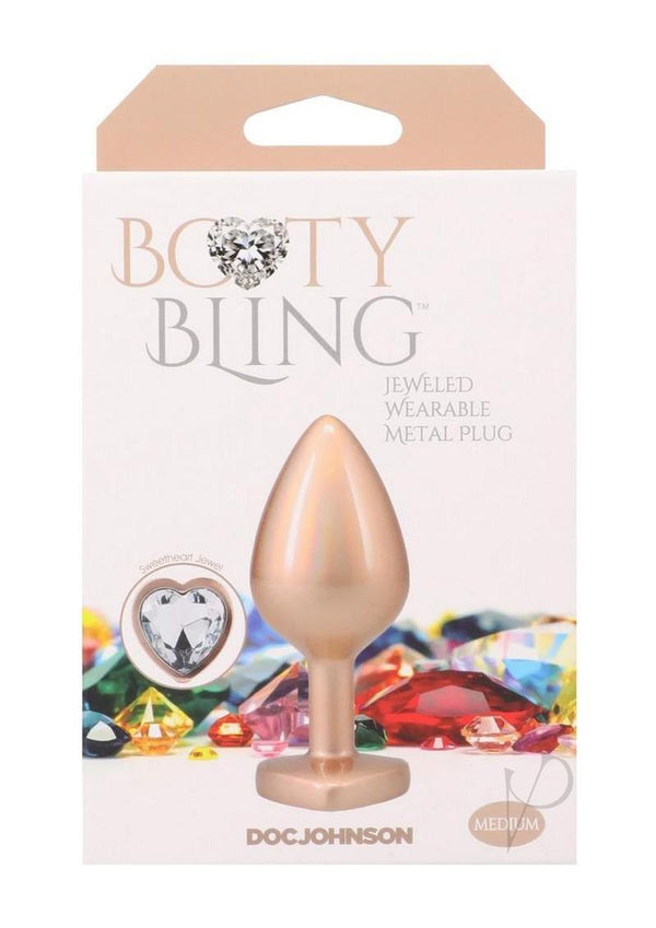 Booty Bling Heart Diamond Jeweled Wearable Metal Plug Medium Gold with colorful gemstones background