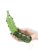 Glas Caressing Cucumber 8.25 Inch Glass Dildo Green held in hand showcasing its textured design.