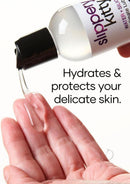 Slippery Kitty Hybrid Lubricant 4 Oz pouring onto a hand to hydrate and protect delicate skin.