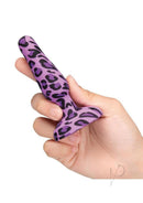 A hand holding the B-Vibe Novice Plug Silicone Anal Plug Purple Leopard with a playful design.