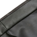 Close-up view of the Adjustable PVC Spanking Skirt With Built-In Thong Black M L showcasing glossy material texture.