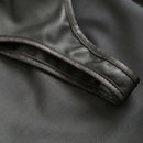 Close-up of the Adjustable PVC Spanking Skirt With Built-In Thong Black M L showing its sleek strap design.