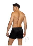 Man wearing Playboy Burnout Bunny Boxer Briefs Small Black, showcasing the back view in sleek black satin.