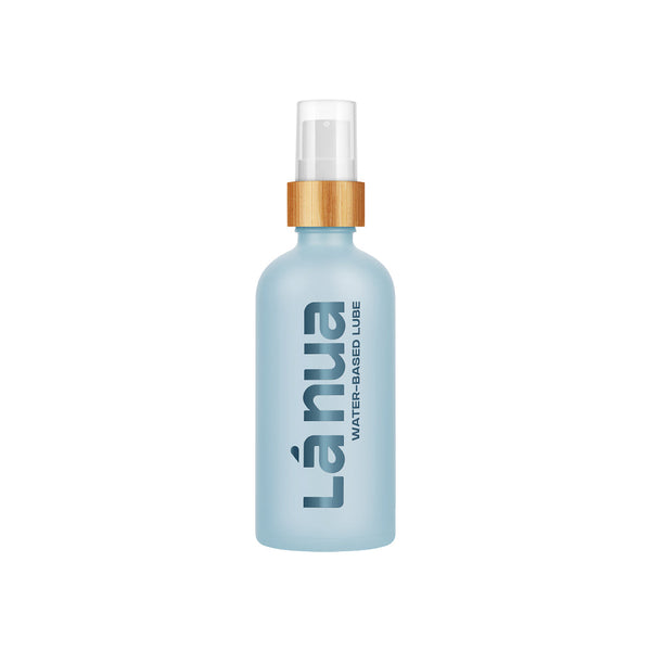 La Nua Unflavored Water Based Lubricant 3.4 Oz bottle on a white background with a natural wood top.