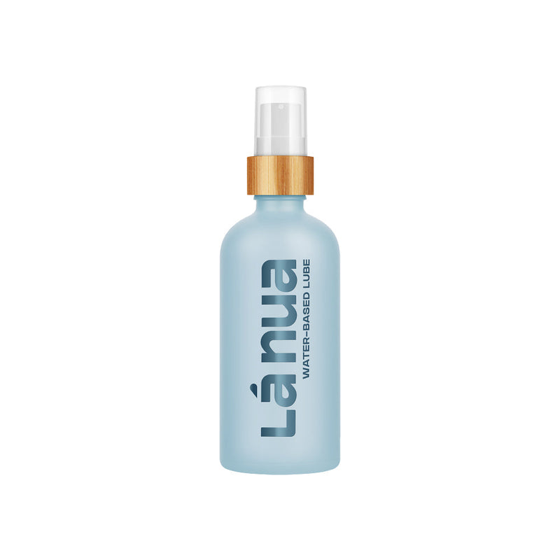 La Nua Unflavored Water Based Lubricant 3.4 Oz bottle on a white background with a natural wood top.
