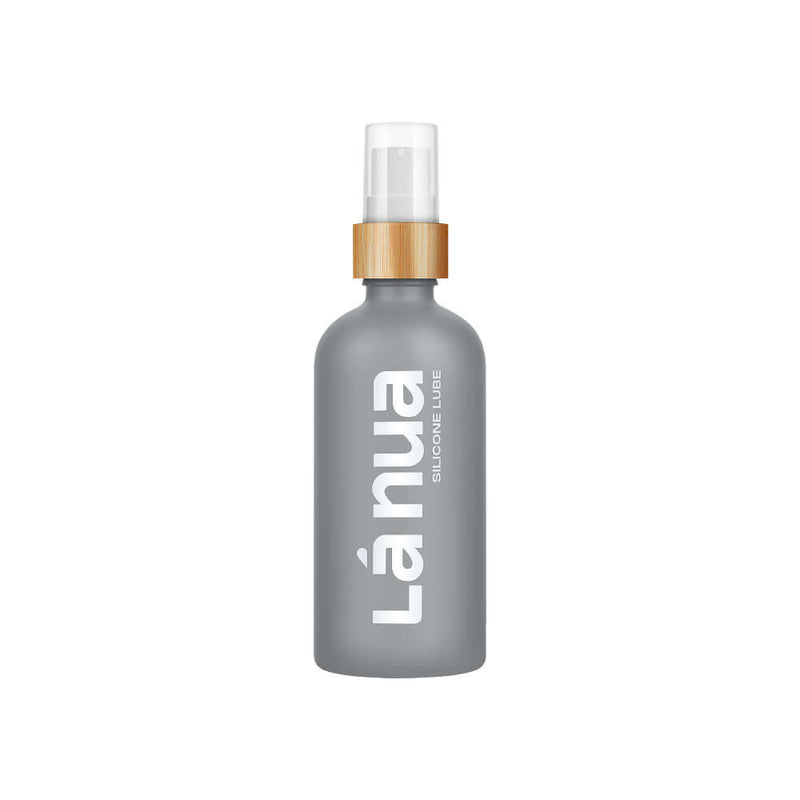 La Nua Unscented Silicone Lubricant 3.4 Oz in a sleek gray bottle with a bamboo pump.