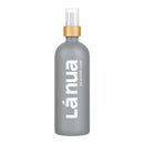 La Nua Unscented Silicone Lubricant 6.8 Oz bottle with bamboo cap and sleek gray design.
