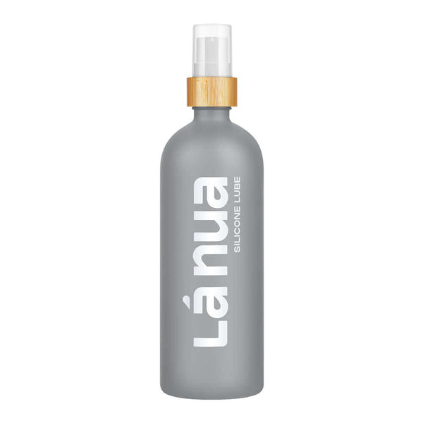 La Nua Unscented Silicone Lubricant 6.8 Oz bottle with bamboo cap and sleek gray design.
