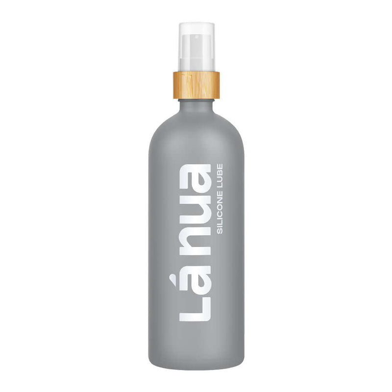 La Nua Unscented Silicone Lubricant 6.8 Oz bottle with bamboo cap and sleek gray design.