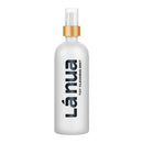 La Nua Mist Toy Cleaner 6.8 Oz bottle with black label and wooden cap for safe and gentle toy cleaning.