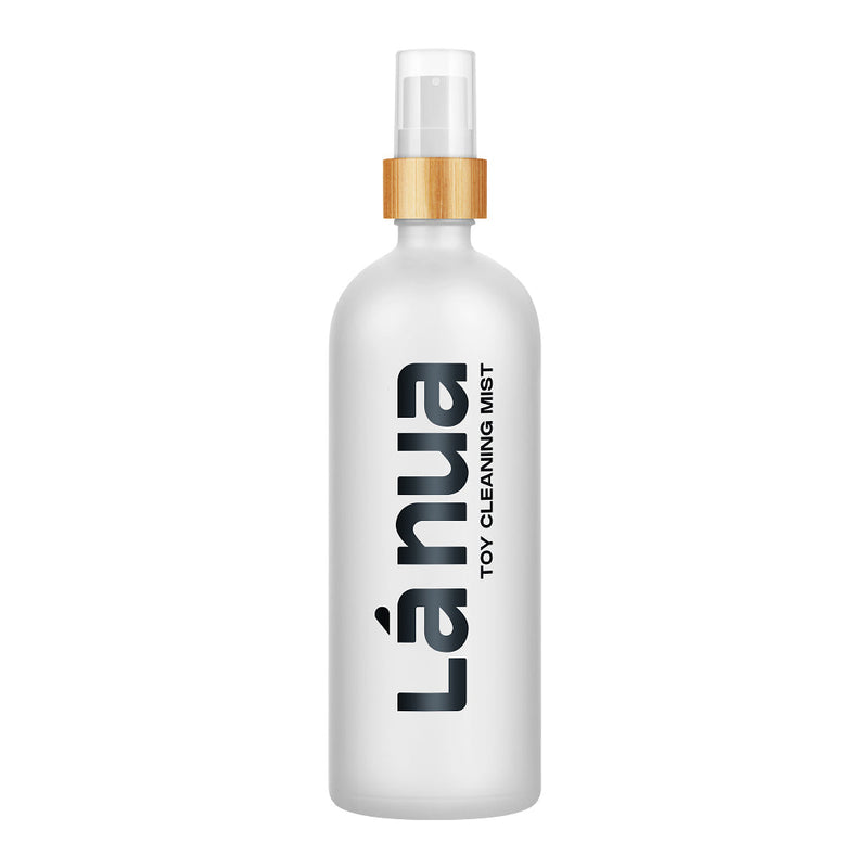 La Nua Mist Toy Cleaner 6.8 Oz bottle with black label and wooden cap for safe and gentle toy cleaning.