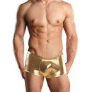 Male Power Heavy Metal Mini Short Gold Medium worn by a muscular man showcasing a shiny finish.