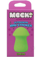 Mochi Ultraskyn Mini Stroker Green packaging with a playful mushroom design on a vibrant pink background.