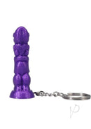Polynesian Ti-Key Chains Uhane Ino Spirit Idol Purple keychain with intricate designs.
